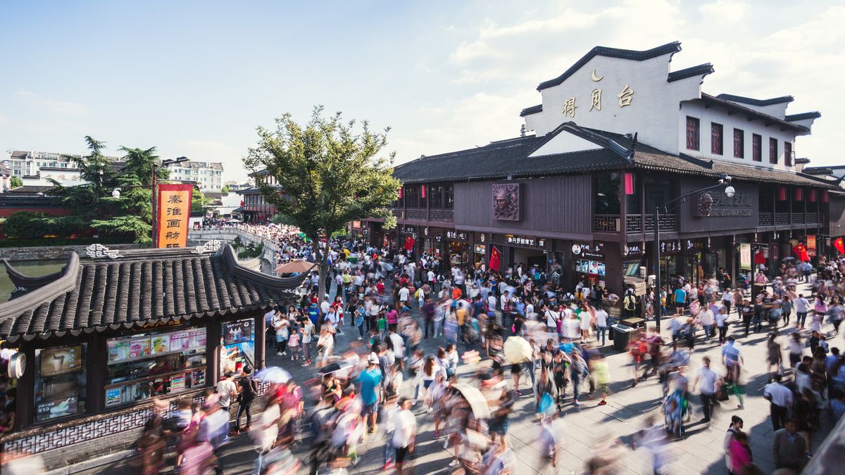 A shopping district in Nanjing is bustling with people before the coronavirus hit.