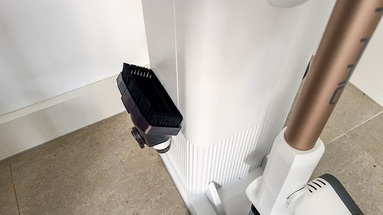 An attachment placed on the side of the Shark Cordless Detect Pro's dock