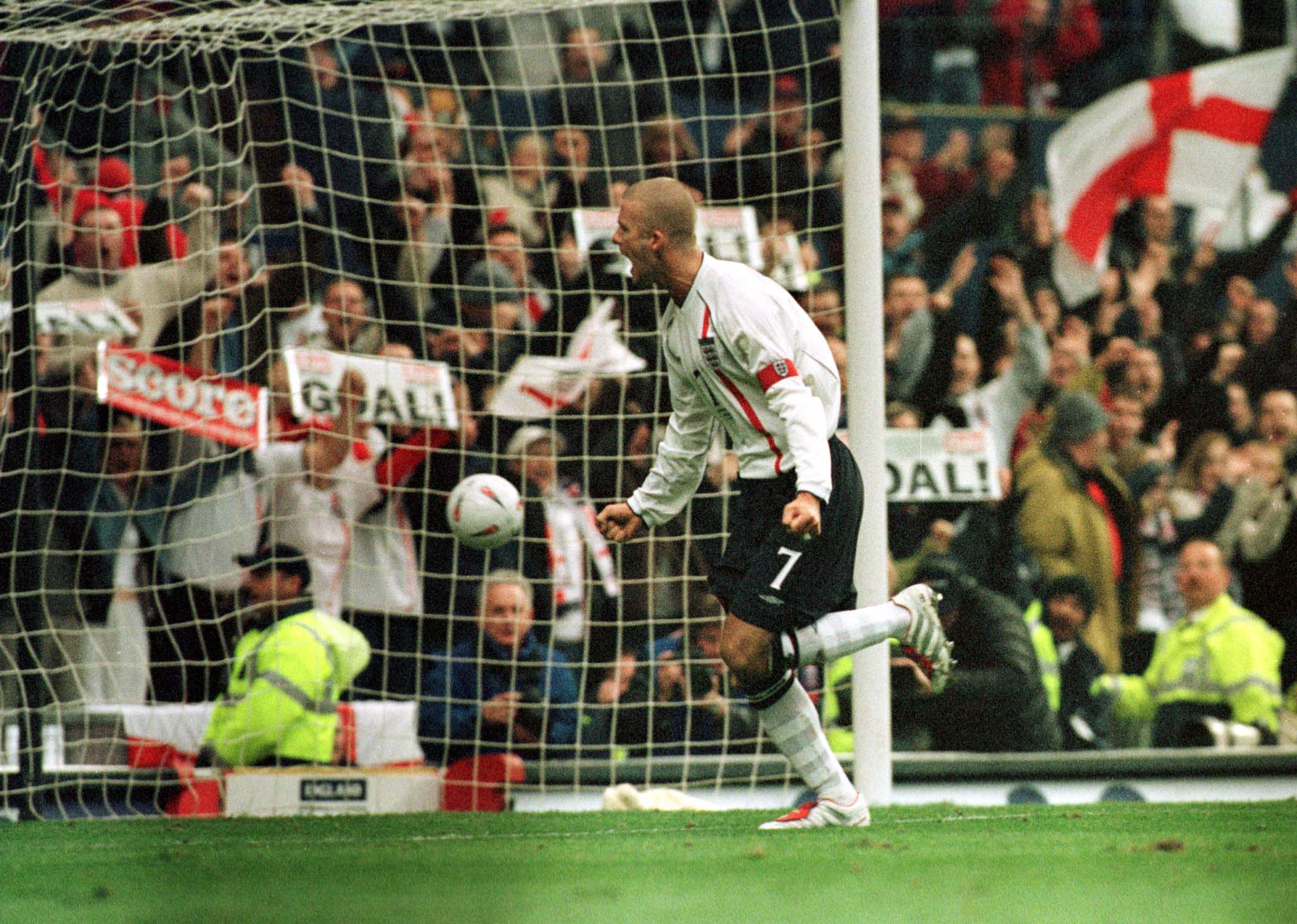 David Beckham celebrates after scoring a penalty for England against Sweden in November 2001.