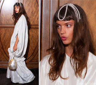 Simone Rocha dress and bag; Khaite headpiece; Tacori ring.