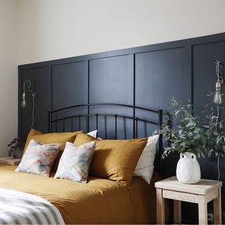 bedroom with painted wall panelling