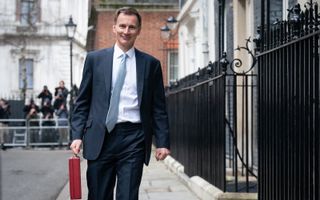 Jeremy Hunt with his ministerial box about to deliver the Spring Budget