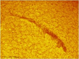 John Chumack took this photo of a solar filament from his backyard in Dayton, Ohio on Aug. 11, 2013.