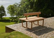 An outdoor bench with two sides