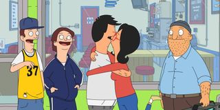 Bob and Linda kissing in Bob's Burgers.