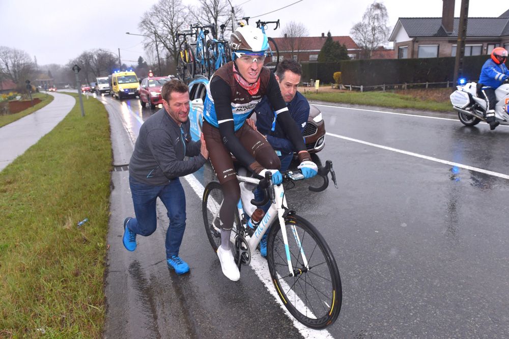 Romain Bardet (AG2R-La Mondiale) gets a push after an early flat