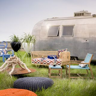 nest sofa with armchair and footstool and pouffes