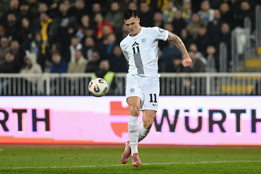 Slovenia's forward #11 Benjamin Sesko controls the ball during the FIFA World Cup 2026 Group B qualification football match between Kosovo and Slovenia, at the Pristina City Stadium in Pristina, on October 10, 2025. (Photo by Armend NIMANI / AFP)