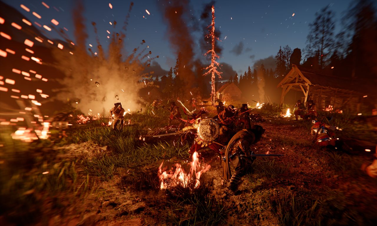 A battle scene in Crimson Desert, with Kliff fighting off ambushers in a burning camp