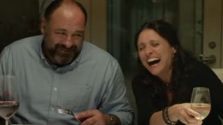 Julia Louis-Dreyfus laughing with James Gandolfini in Enough Said