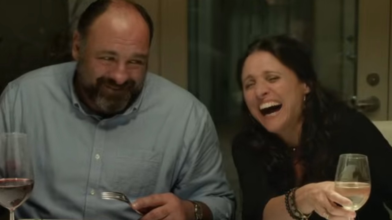 Julia Louis-Dreyfus laughing with James Gandolfini in Enough Said