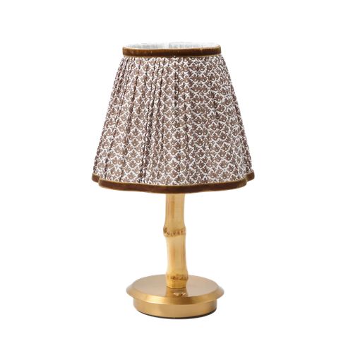 Portable lamp with brown patterned lamp shade and gold base