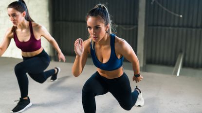Women complete a HIIT workout