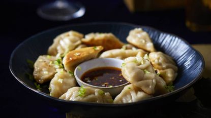 Chicken gyoza with spring onion and sprouts