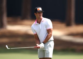 Charlie Reiter eyes up an iron shot from the middle of the fairway