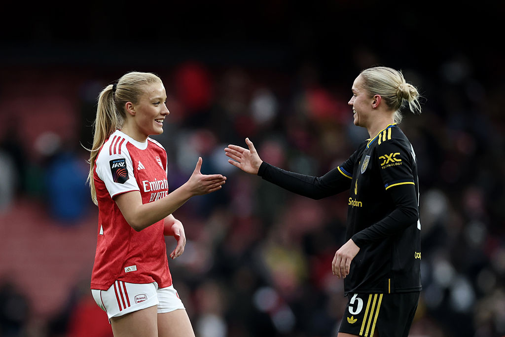 Smilla Holmberg of Arsenal shakes hands with Hanna Lundkvist of Man United during the Barclays Women's Super League match between Arsenal and Manchester United at Emirates Stadium on January 10, 2026 in London, England.