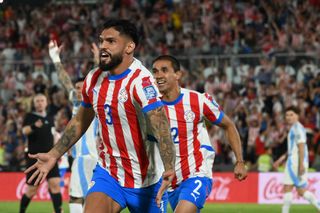 Paraguay's defender #03 Omar Alderete celebrates after scoring during the 2026 FIFA World Cup South American qualifiers football match between Paraguay and Argentina at the Ueno Defensores del Chaco stadium in Asuncion on November 14, 2024.