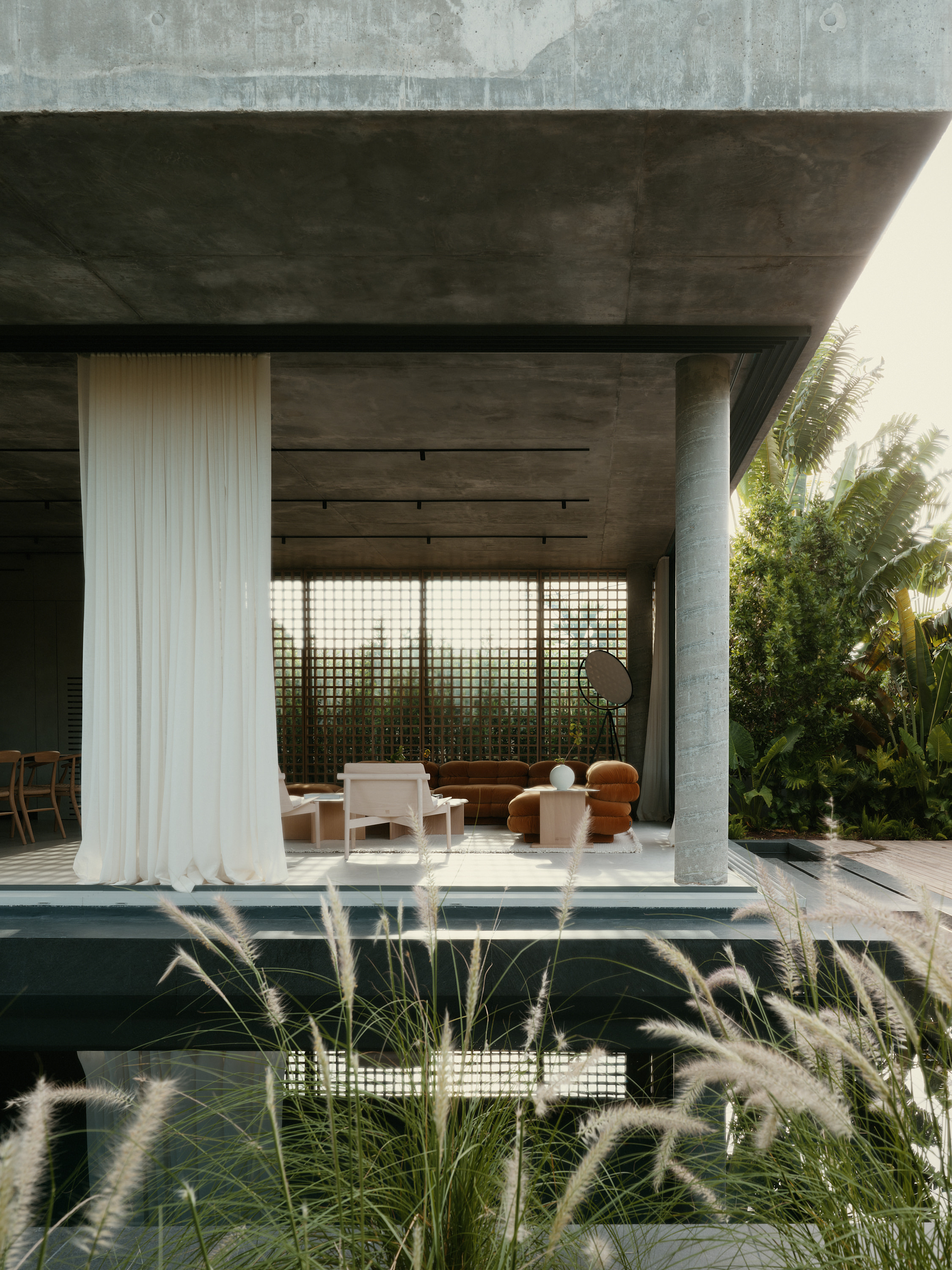 Miami house by studiokp2, a minimalist concrete building with clean surfaces and monumental volumes