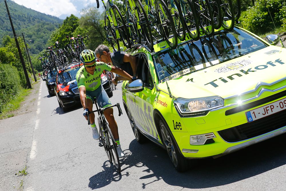 Michael Valgren (Tinkoff) gets some mechanical help from the team car.