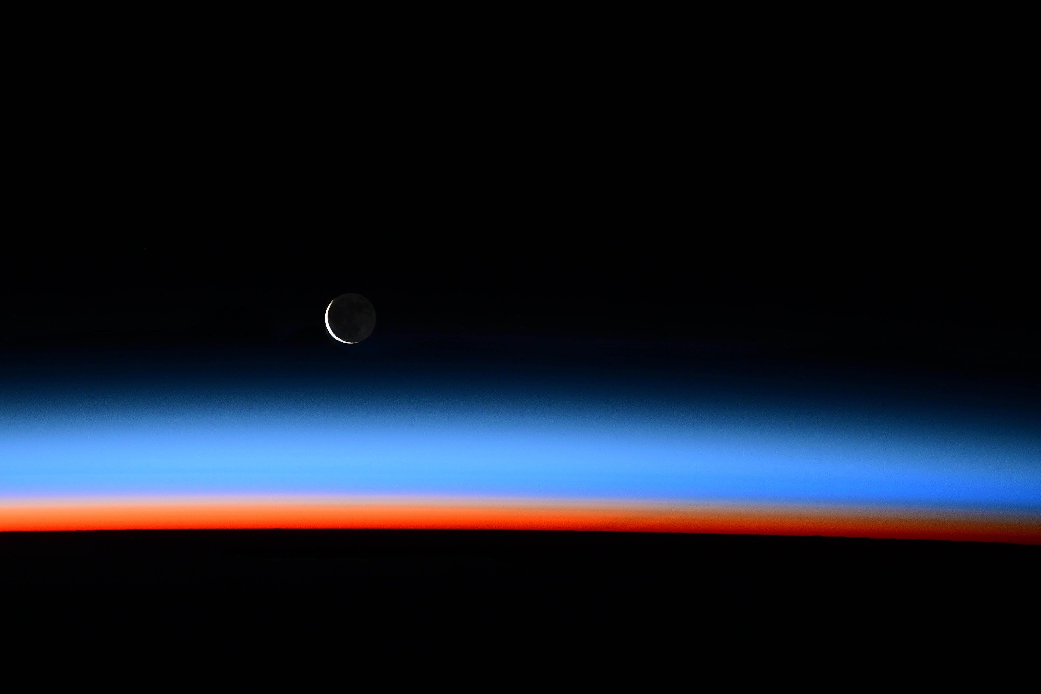 An image of the crescent moon from the ISS