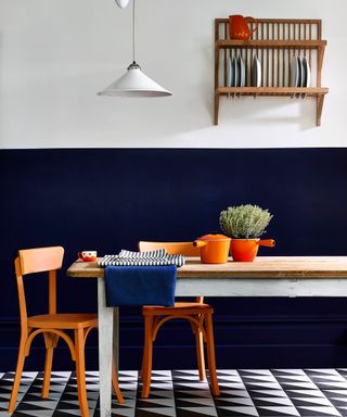 dining space with half painted wall