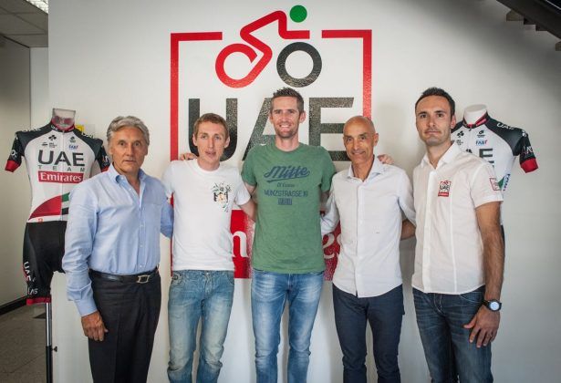 Dan Martin and Rory Sutherland pose with the UAE Team Emirates management: Giuseppe Saronni, Mauro Gianetti and Carlo Saronni