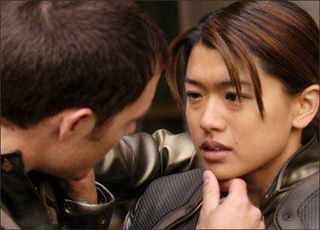 The romance between Sharon (Grace Park) and Helo (Tahmoh Penikett) in Season 1 was a story arc that Moore designed to run entire year.