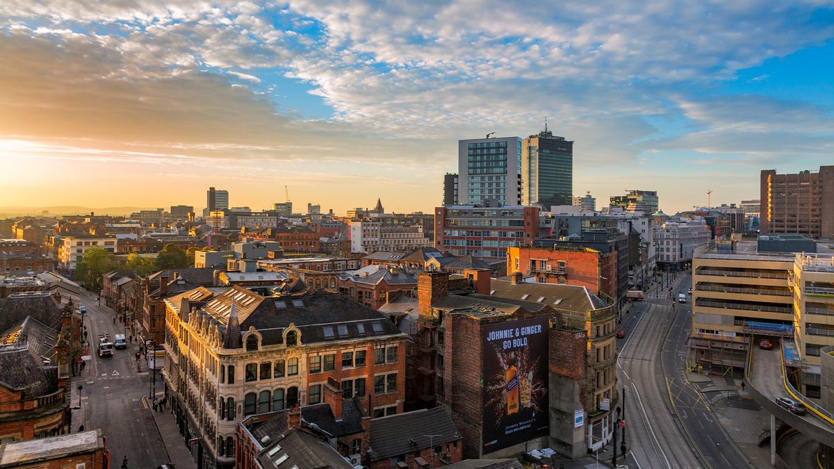 Manchester, England, home of edge infrastructure company Pulsant,pictured at dusk with skyline in background.