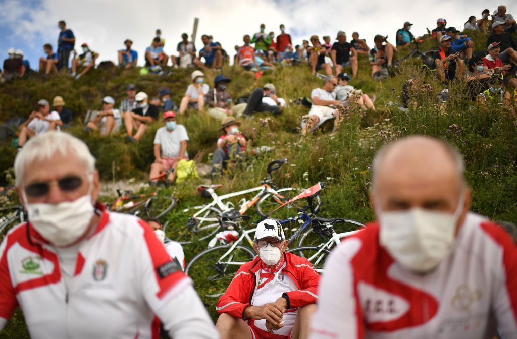 Spectators wait for the riders near the finish line in Puy Mary during the 13th stage of the 107th edition of the Tour de France cycling race, 191 km between Chatel-Guyon and Puy Mary, on September 11, 2020. (Photo by Anne-Christine POUJOULAT / AFP) (Photo by ANNE-CHRISTINE POUJOULAT / AFP)