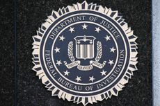 The seal of the U.S. Department of Justice. 