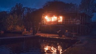 The boat house on fire in The Jetty