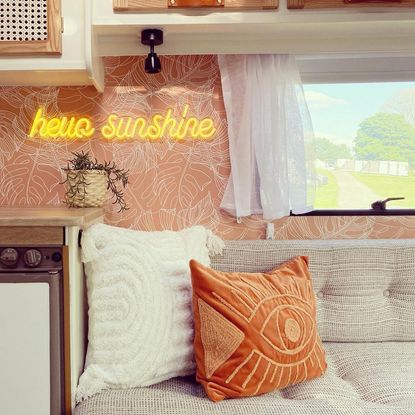 caravan interior with coral wallpaper