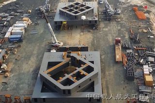 Launch platforms for the Long March 5 and Long March 7 boosters under construction at China’s Wenchang Launch Center.