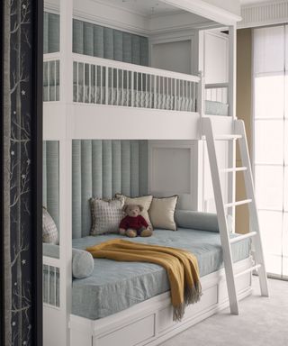 White bunkbed , blue mattress cover