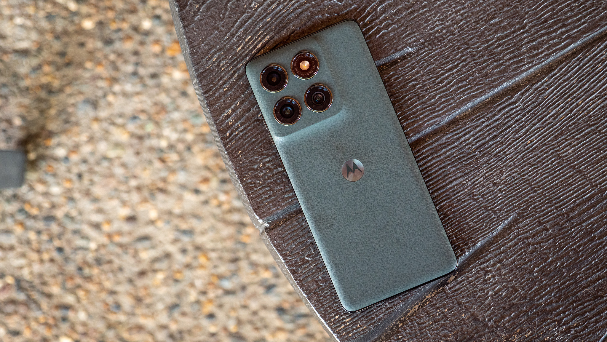 The vegan leather back of the forest green Motorola Edge 2025