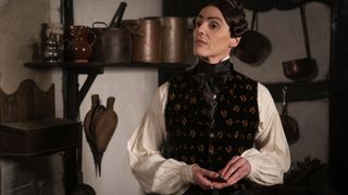 Suranne Jones as Anne Lister in Gentleman Jack in a white blouse and dark waistcoat