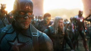 A close-up of Captain America, with Hulk, Thor, and Iron Man in the background, in Avengers: Endgame