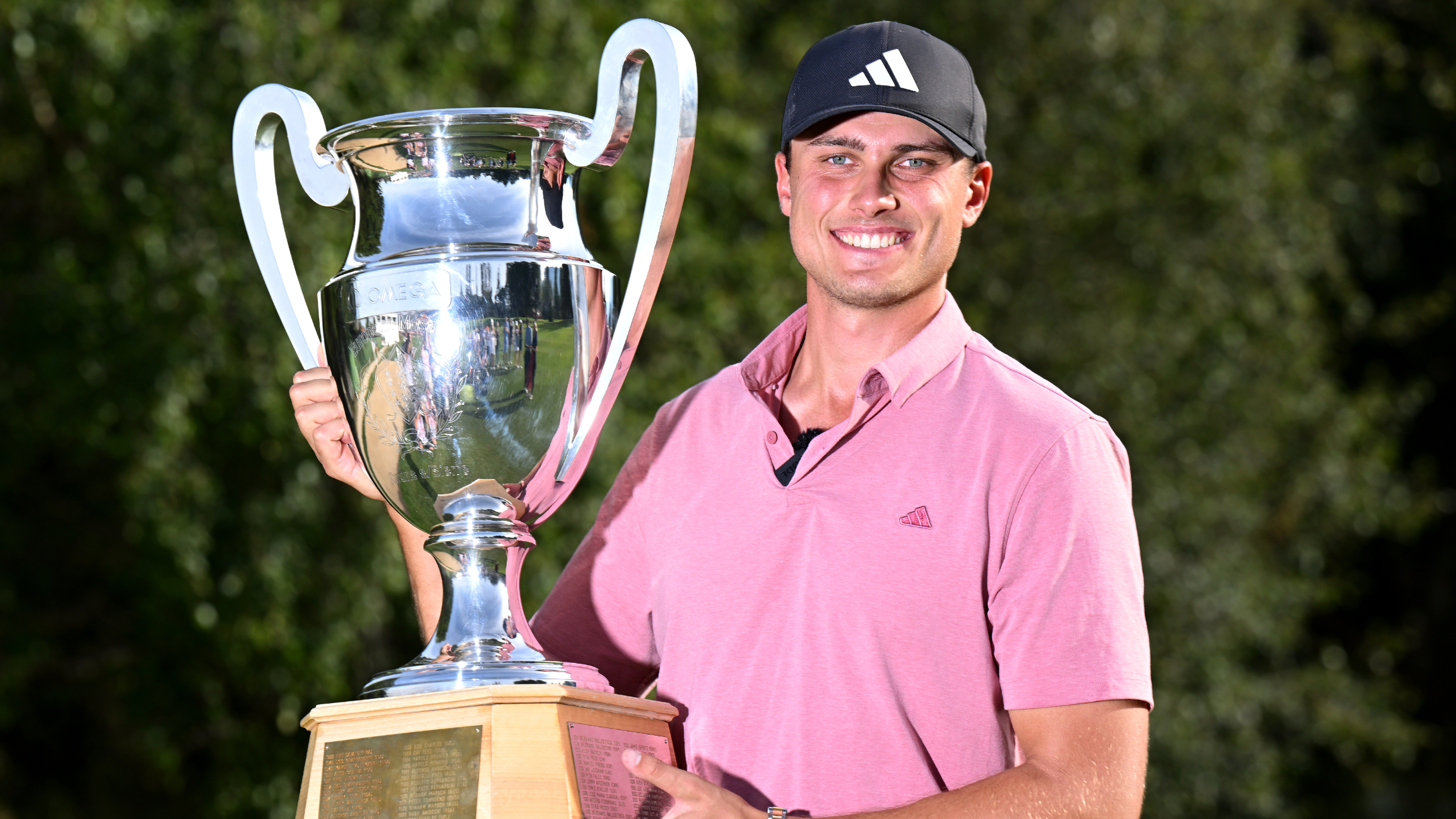 Ludvig Aberg photographed with the European Masters trophy