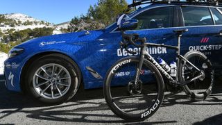 Tour de France Bikes 2021: Deceuninck QuickStep's Specialized S-Works Tarmac leans against the team car