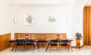 Tilden hotel with frames on wall and wooden furniture