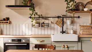 Kitchen with hanging items on walls