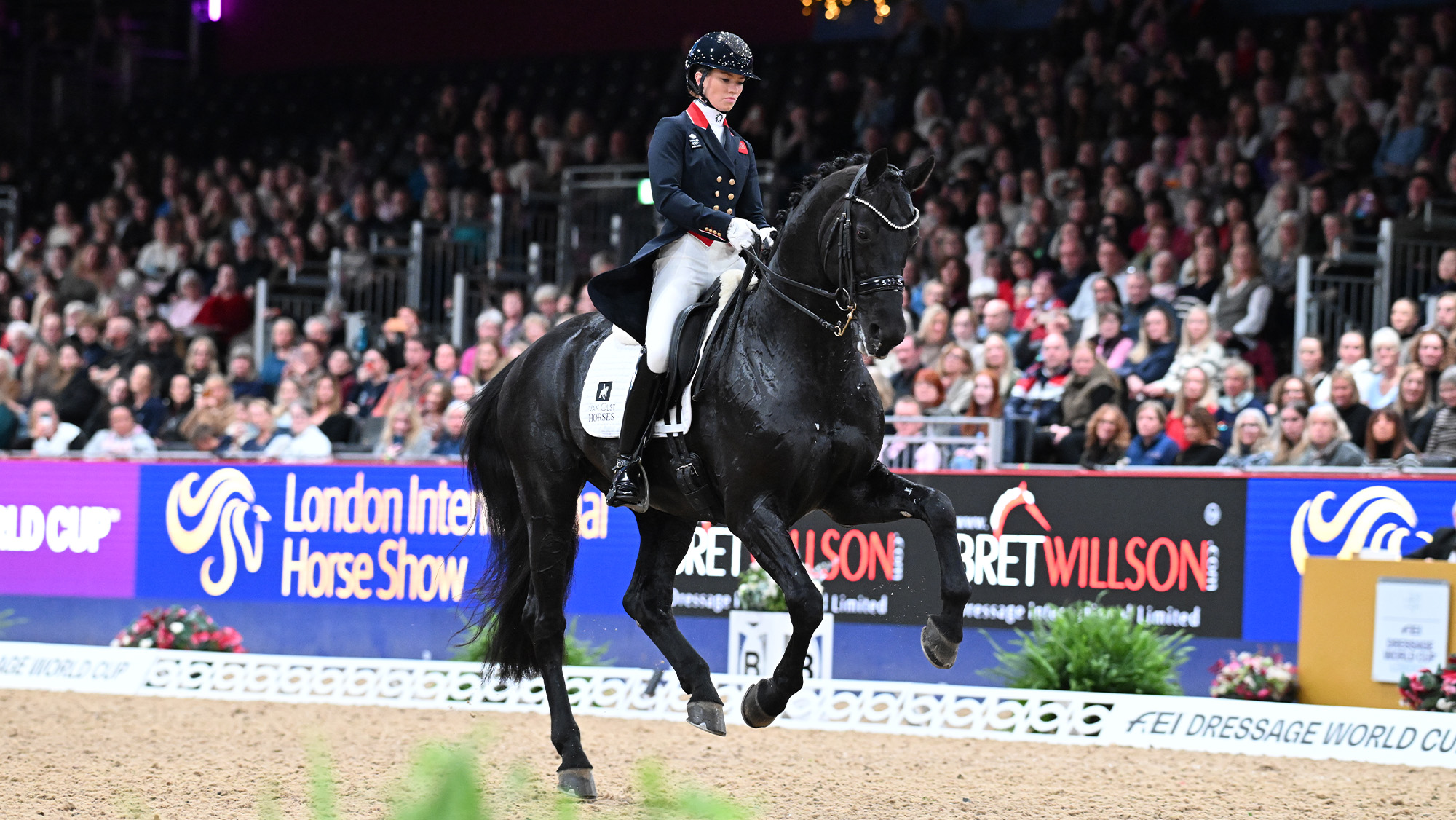 Lottie Fry riding Glamourdale at London International Horse Show