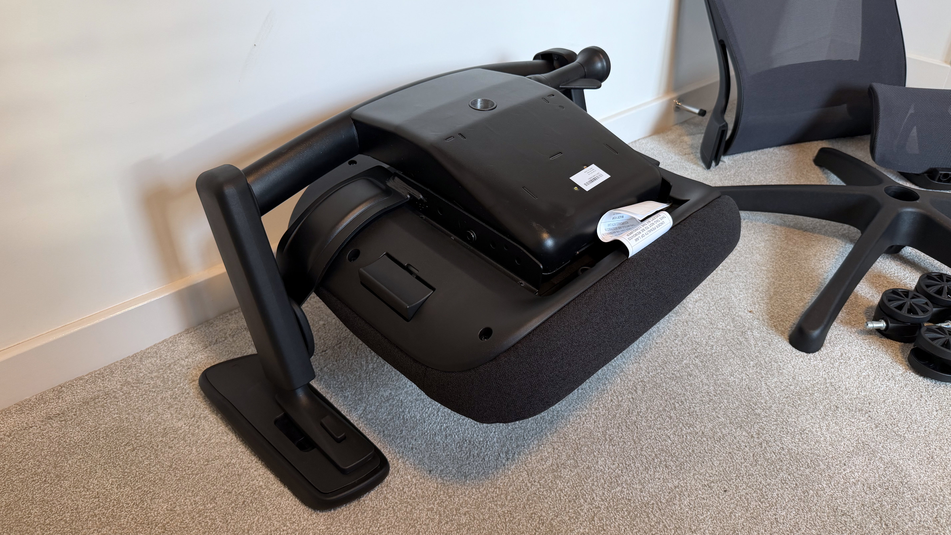 The underside of the seat base on the Elgato Embrace
