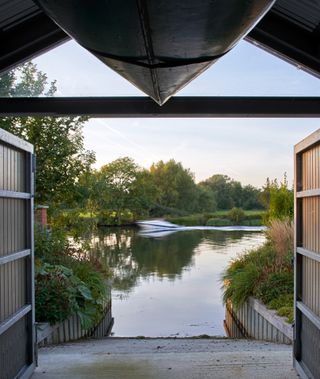 inside looking out towards the water at March House, a future-proof home by the River Thames