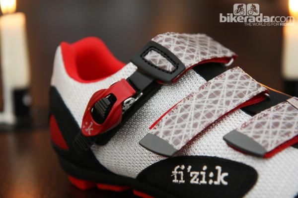 The fi'zi:k M5 mountain bike shoes feature aluminum buckles and sailcloth straps.