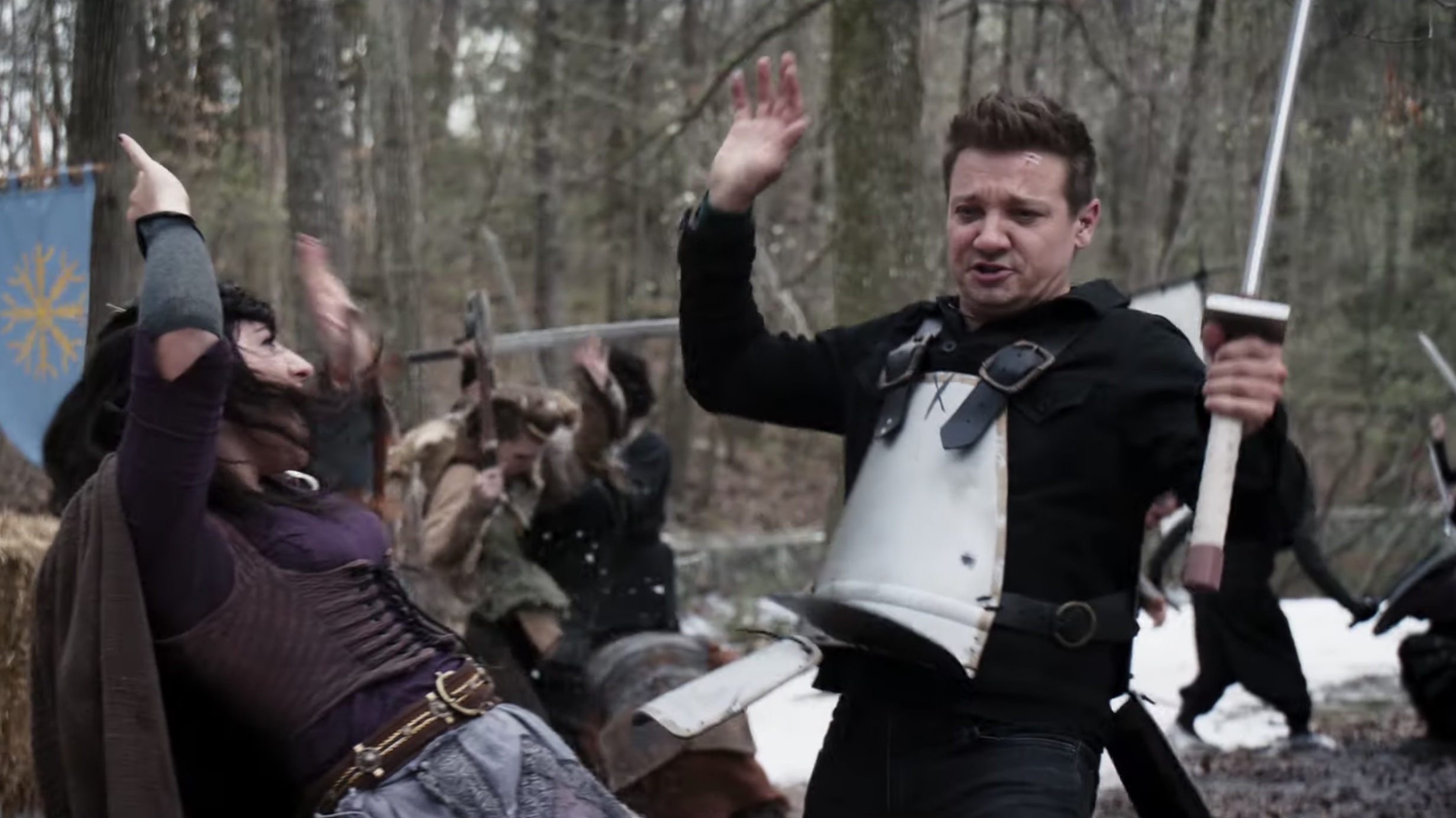 Jeremy Renner as Clint Barton/Hawkeye, sword fighting at a Renn Faire in the Hawkeye show