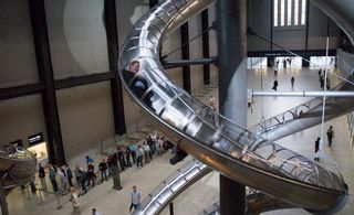 Inside the Tate with a close-up of a human slide swirling around the exhibition space.