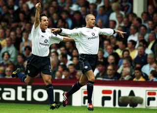 David Beckham celebrates with Gary Neville after scoring for Manchester United against West Ham at Upton Park in 2000.