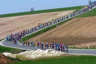 The peloton passes through the Wallonian countryside