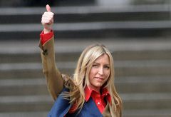 Heather Mills celebrates after securing a £24.3 million divorce settlement